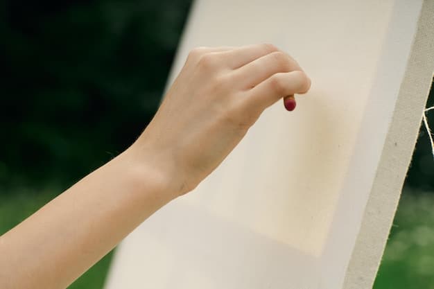 A close-up shot of a hand carefully cutting out paper coupons from a Sunday newspaper circular, emphasizing the tactile and traditional nature of paper couponing.