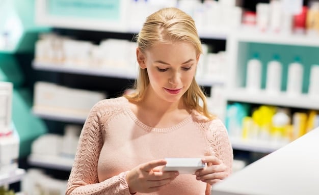 A person standing in the beauty aisle of a drugstore, using a mobile app on their smartphone to scan a product. The app displays available coupons and discounts for that specific item.