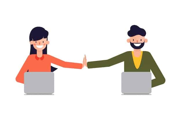 Two people smiling and shaking hands over a laptop, suggesting a successful online negotiation.