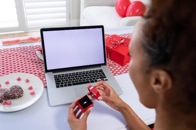 A person browsing Valentine's Day deals on a laptop, with a credit card and coffee cup next to it. The screen displays various discounts and promotional offers for gifts and experiences.