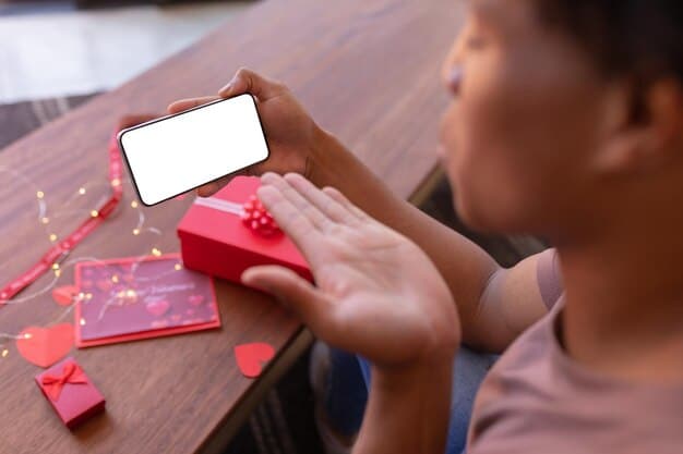 A close-up of a smartphone screen displaying a coupon code for a Valentine's Day gift. The background is blurred, highlighting the importance of the discount.
